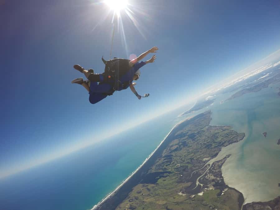 Auckland: 13000, 16000, or 18000-Foot Tandem Skydive - The parachute ride and coastal views