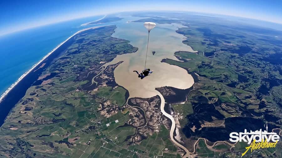 Auckland: 13000, 16000, or 18000-Foot Tandem Skydive - Landing, photos, and the real cost
